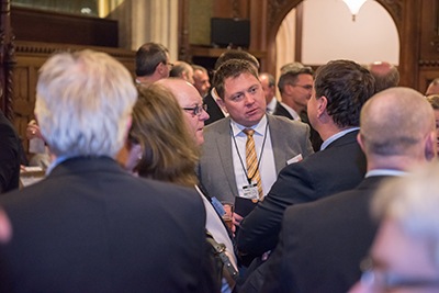 Driver Trett Houses of Parliament event guests talking