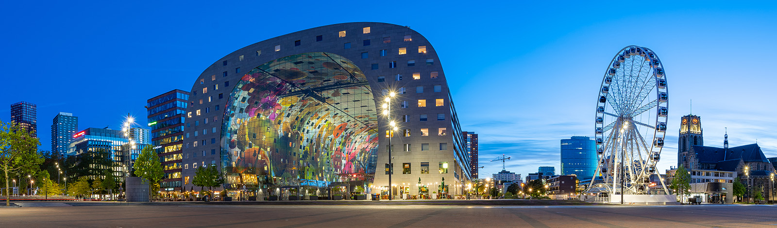 Panorama view of Markthal at night in Rotterdam city, Netherlands.