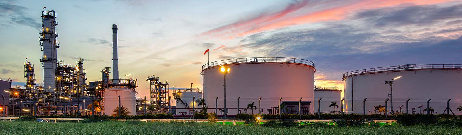 View of oil refinery at sunset