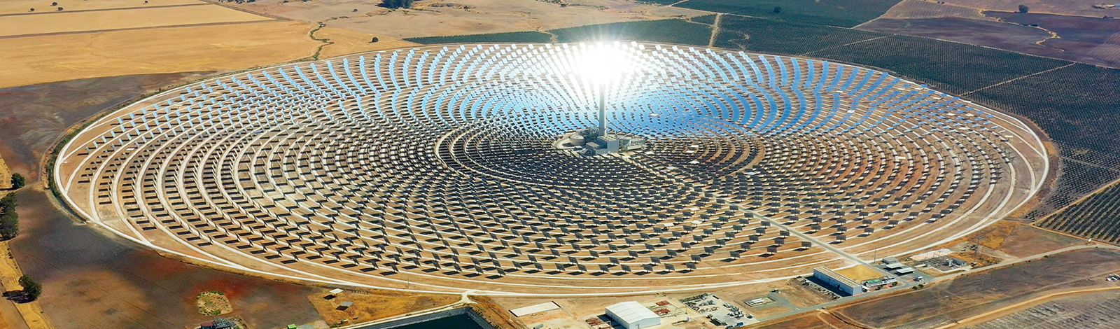 Aerial view of a large solar farm, in a circle formation