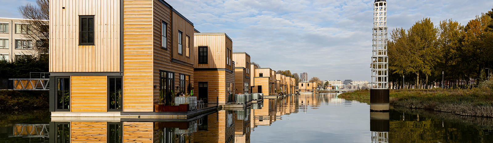 A view of residential floating buildings, on a river